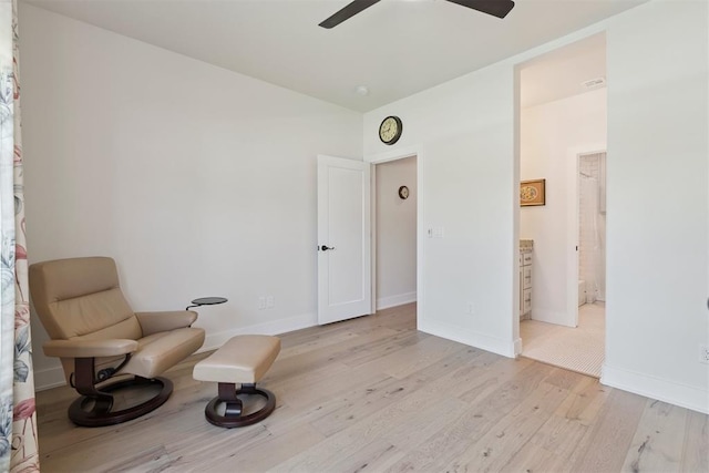 200 Pont Neuf Ct, Edmond, OK 73034 - sitting room with light wood finished floors and a ceiling fan