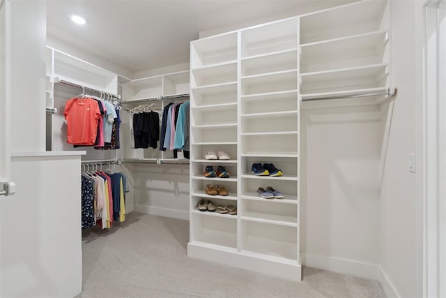 200 Pont Neuf Ct, Edmond, OK 73034 - spacious closet with carpet floors