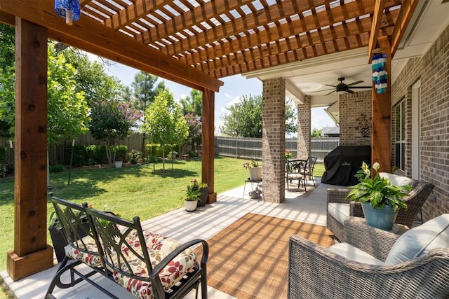 200 Pont Neuf Ct, Edmond, OK 73034 - fenced backyard featuring area for grilling, a pergola, ceiling fan, outdoor dining space, and a patio