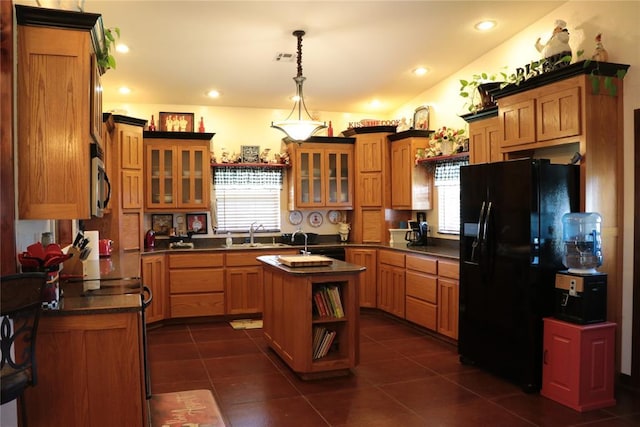 11800 Bryant Rd, Lexington, OK 73051 - kitchen with black refrigerator with ice dispenser, dark countertops, open shelves, a kitchen island, and dark tile patterned floors