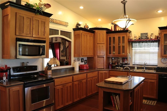 11800 Bryant Rd, Lexington, OK 73051 - kitchen featuring appliances with stainless steel finishes, dark countertops, dark tile patterned flooring, glass insert cabinets, and recessed lighting
