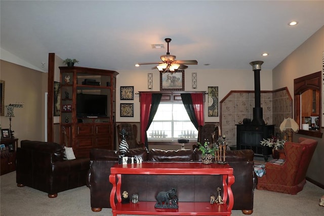11800 Bryant Rd, Lexington, OK 73051 - living room featuring carpet flooring, a ceiling fan, a wood stove, and recessed lighting
