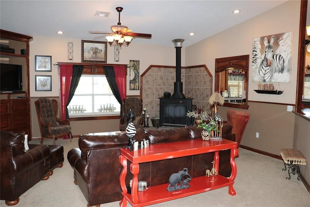 11800 Bryant Rd, Lexington, OK 73051 - carpeted living room with a ceiling fan, a wood stove, and recessed lighting