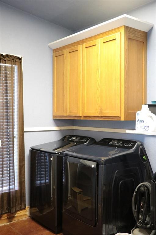 11800 Bryant Rd, Lexington, OK 73051 - laundry area featuring independent washer and dryer and cabinet space