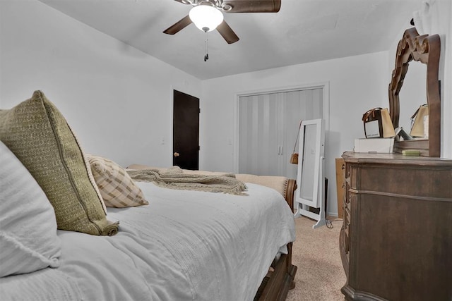 323 W 13th St, Snyder, OK 73566 - bedroom with light carpet, ceiling fan, and a closet