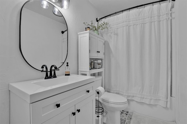 323 W 13th St, Snyder, OK 73566 - bathroom featuring vanity, shower / tub combo, and tile patterned floors