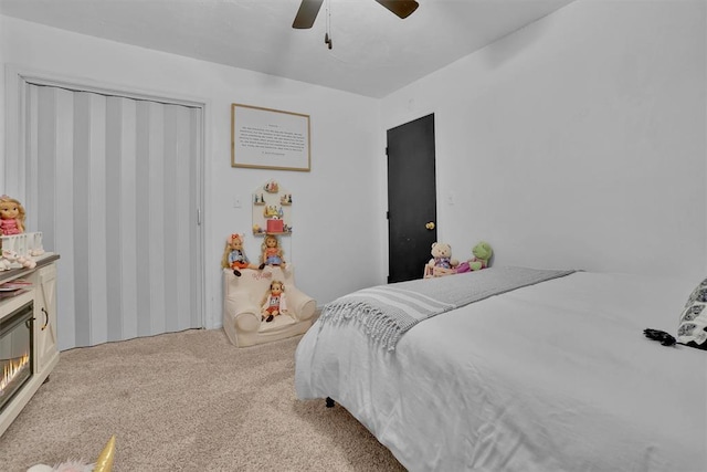 323 W 13th St, Snyder, OK 73566 - carpeted bedroom with a ceiling fan