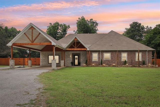 9228 E Cardinal Pl, Midwest City, OK 73130 - view of front of property with driveway, an attached carport, an attached garage, and a shingled roof