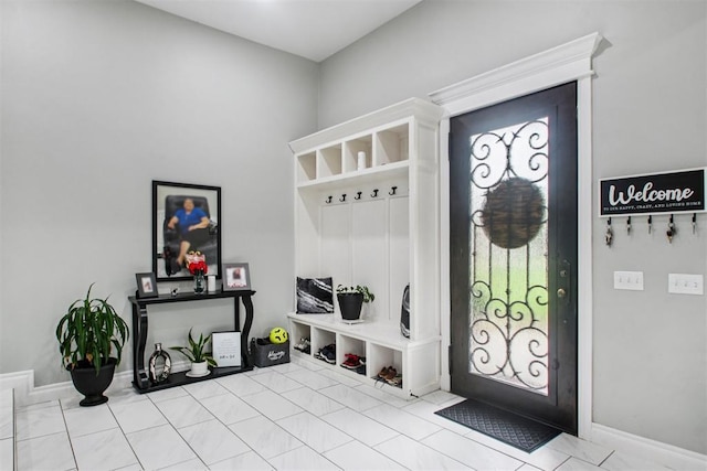 9228 E Cardinal Pl, Midwest City, OK 73130 - mudroom featuring tile patterned floors and baseboards