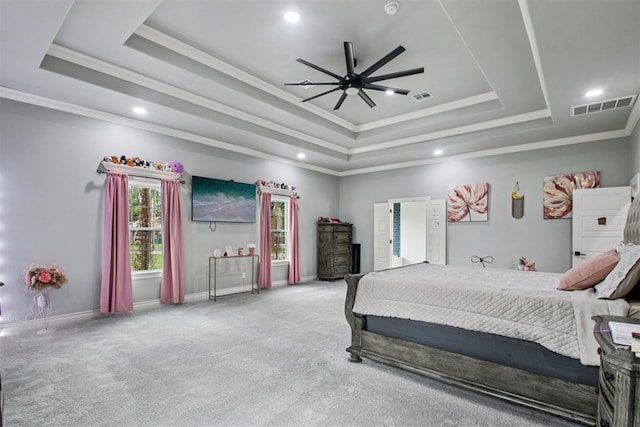 9228 E Cardinal Pl, Midwest City, OK 73130 - bedroom featuring a tray ceiling, crown molding, carpet floors, and recessed lighting