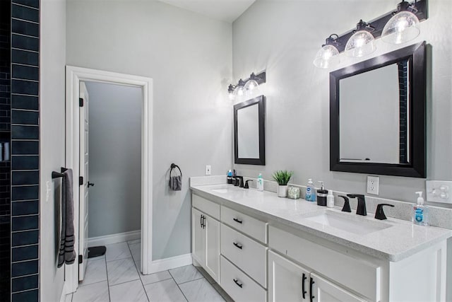 9228 E Cardinal Pl, Midwest City, OK 73130 - full bath featuring double vanity and marble look tile flooring
