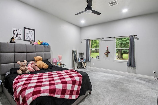 9228 E Cardinal Pl, Midwest City, OK 73130 - carpeted bedroom with recessed lighting and ceiling fan