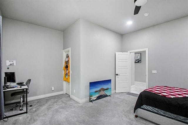 9228 E Cardinal Pl, Midwest City, OK 73130 - carpeted bedroom with an office area and a ceiling fan