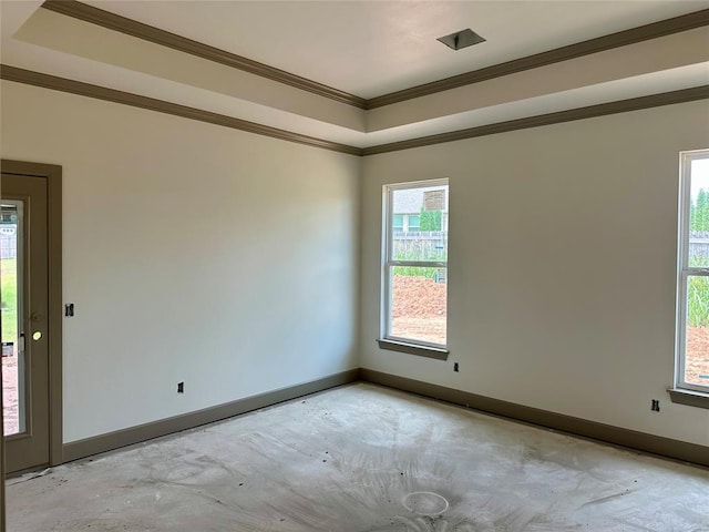 14721 Ashore Dr, Oklahoma City, OK 73142 - empty room with a tray ceiling, concrete flooring, and crown molding
