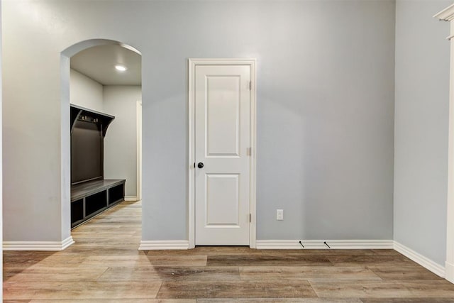 9021 NW 74th St, Yukon, OK 73099 - mudroom with arched walkways and wood finished floors