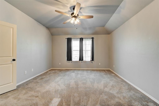 9021 NW 74th St, Yukon, OK 73099 - carpeted spare room with a ceiling fan and vaulted ceiling