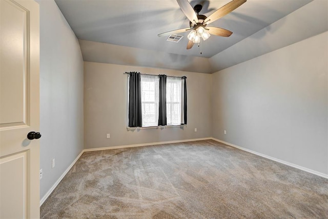 9021 NW 74th St, Yukon, OK 73099 - empty room with carpet, a ceiling fan, and vaulted ceiling