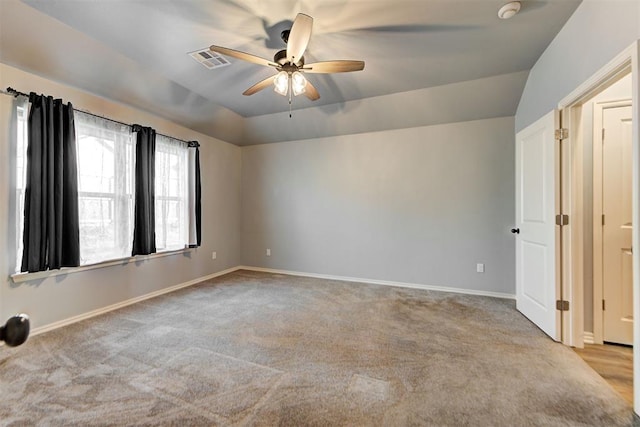9021 NW 74th St, Yukon, OK 73099 - spare room with ceiling fan, carpet floors, vaulted ceiling, and a smoke detector