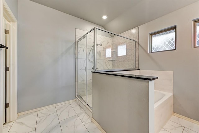 9021 NW 74th St, Yukon, OK 73099 - bathroom featuring marble finish floors, a garden tub, a shower stall, and recessed lighting