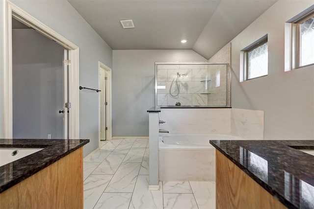 9021 NW 74th St, Yukon, OK 73099 - bathroom with vanity, marble look tile flooring, a bath, a marble finish shower, and recessed lighting