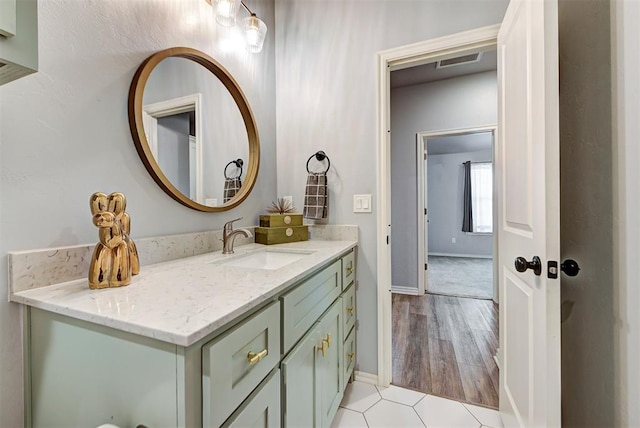 9021 NW 74th St, Yukon, OK 73099 - bathroom with vanity and baseboards