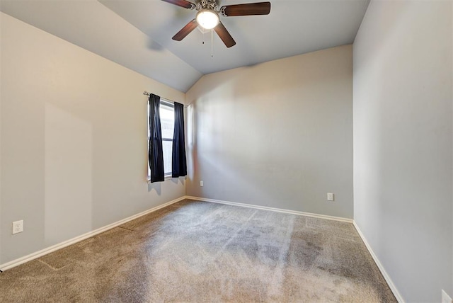 9021 NW 74th St, Yukon, OK 73099 - unfurnished room with carpet flooring, a ceiling fan, and vaulted ceiling