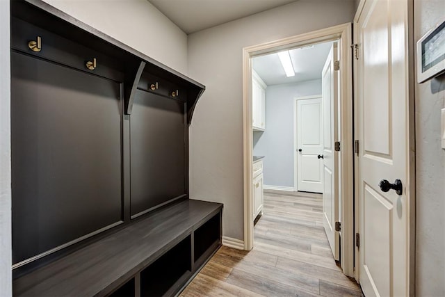 9021 NW 74th St, Yukon, OK 73099 - mudroom featuring light wood-style floors and baseboards