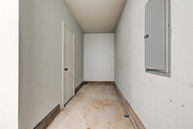 9021 NW 74th St, Yukon, OK 73099 - corridor featuring electric panel and concrete floors