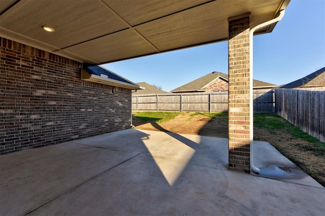 9021 NW 74th St, Yukon, OK 73099 - fenced backyard featuring a patio