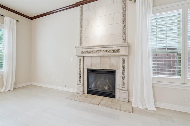 1008 Trisha Ln, Norman, OK 73072 - unfurnished living room featuring a fireplace and ornamental molding