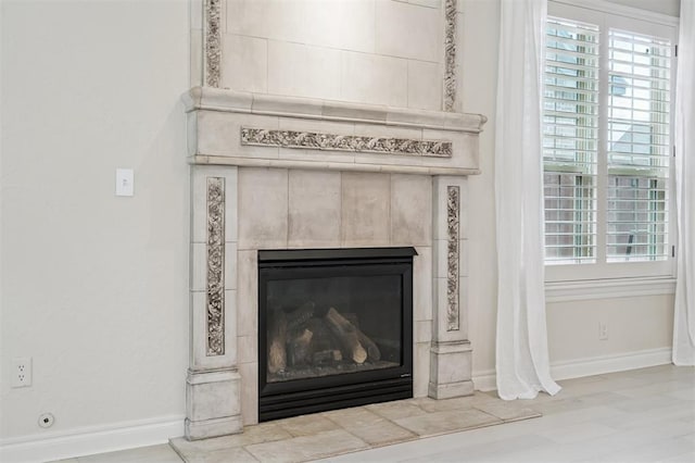 1008 Trisha Ln, Norman, OK 73072 - detailed view of baseboards and a tile fireplace