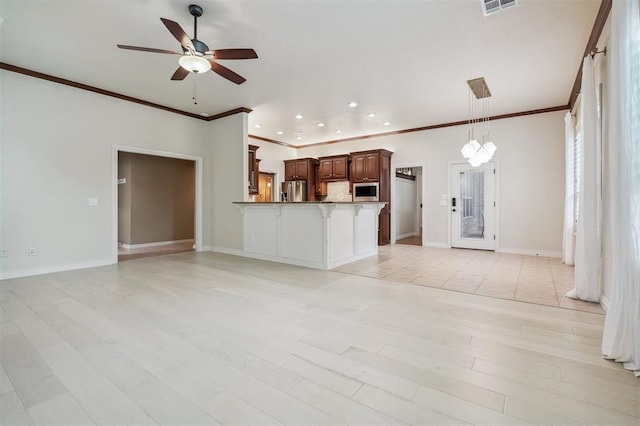 1008 Trisha Ln, Norman, OK 73072 - unfurnished living room with a ceiling fan, ornamental molding, recessed lighting, and light wood-type flooring