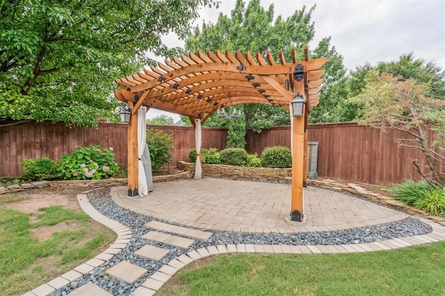 1008 Trisha Ln, Norman, OK 73072 - fenced backyard with a pergola and a patio