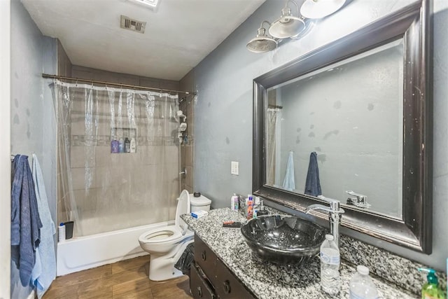 321 W 1st St, Wewoka, OK 74884 - bathroom with shower / bath combo, vanity, and wood finished floors