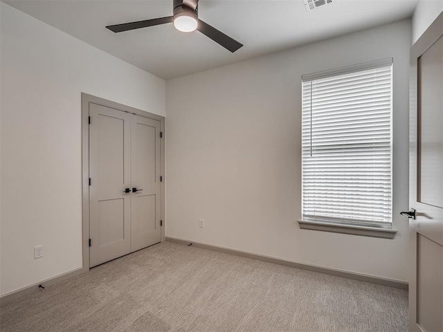 6609 NW 147th St, Oklahoma City, OK 73142 - unfurnished bedroom with light carpet and ceiling fan