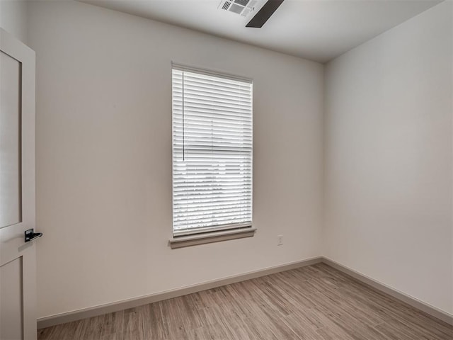6609 NW 147th St, Oklahoma City, OK 73142 - spare room featuring light wood-type flooring
