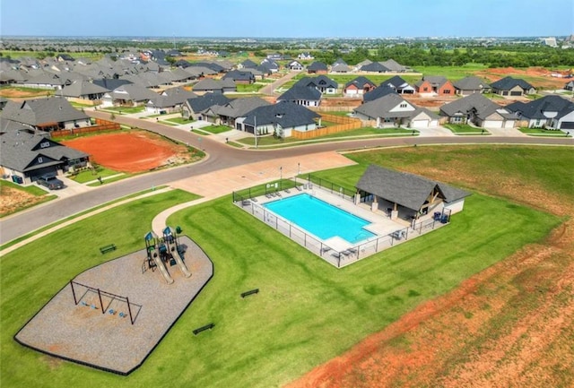 6609 NW 147th St, Oklahoma City, OK 73142 - aerial perspective of suburban area with a pool