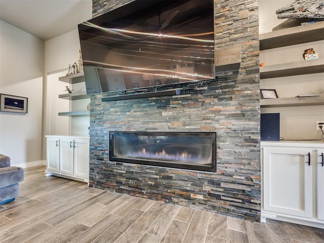 4000 Timber Creek Way, Moore, OK 73165 - unfurnished living room with wood finished floors and a fireplace