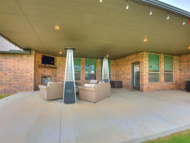 4000 Timber Creek Way, Moore, OK 73165 - view of patio featuring an outdoor living space with a fireplace