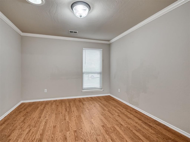 10808 Cheshire Ct, Yukon, OK 73099 - empty room featuring light wood-type flooring and crown molding