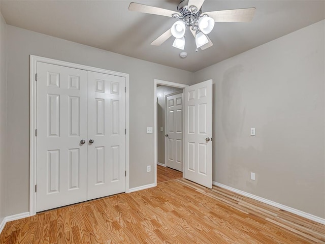 10808 Cheshire Ct, Yukon, OK 73099 - unfurnished bedroom featuring light wood-type flooring, a closet, and a ceiling fan