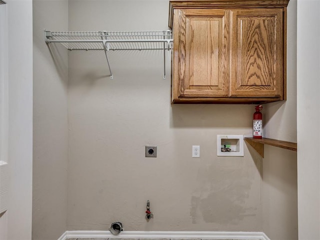 10808 Cheshire Ct, Yukon, OK 73099 - washroom featuring hookup for a washing machine, electric dryer hookup, gas dryer hookup, and cabinet space