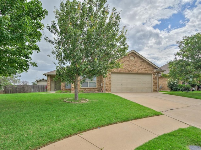 10808 Cheshire Ct, Yukon, OK 73099 - view of front of property featuring concrete driveway, a garage, and brick siding