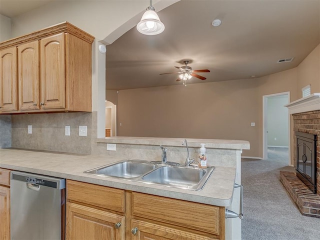 4513 SE 79th Ter, Oklahoma City, OK 73135 - kitchen with dishwasher, light countertops, carpet flooring, and a fireplace