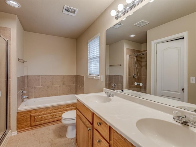 4513 SE 79th Ter, Oklahoma City, OK 73135 - bathroom with a shower stall, a bath, double vanity, tile patterned flooring, and recessed lighting