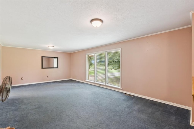 104951 S 3440th Rd, Meeker, OK 74855 - spare room featuring dark carpet, ornamental molding, and a textured ceiling