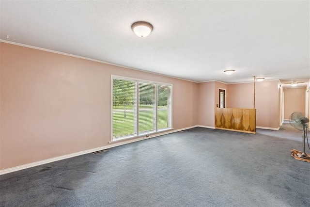 104951 S 3440th Rd, Meeker, OK 74855 - carpeted spare room featuring baseboards and ornamental molding