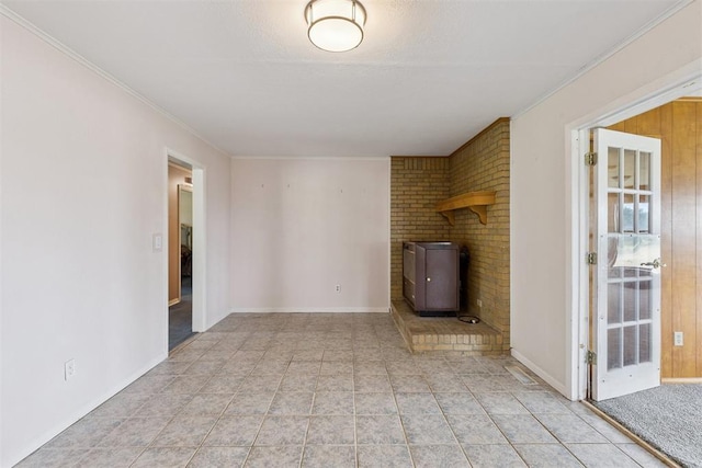 104951 S 3440th Rd, Meeker, OK 74855 - unfurnished living room featuring a wood stove and crown molding