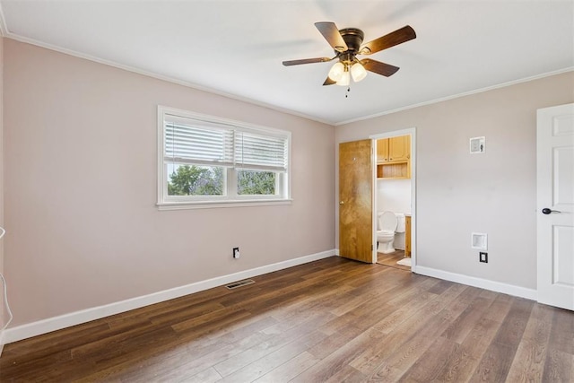 104951 S 3440th Rd, Meeker, OK 74855 - unfurnished bedroom with crown molding, wood finished floors, ensuite bathroom, and a ceiling fan