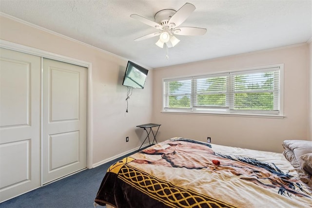 104951 S 3440th Rd, Meeker, OK 74855 - carpeted bedroom featuring ornamental molding, a closet, ceiling fan, and a textured ceiling